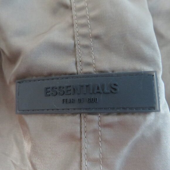 ESSENTIALS FEAR OF GOD Straight Leg Logo Appliquéd Shell Drawstring Shorts Khaki - Picture 7 of 16